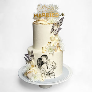 Handpainted dancing portrait butterfly engagement cake