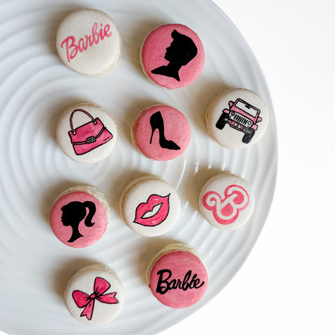 Pink Barbie themed painted macarons