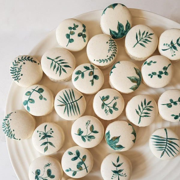 Each macaron is carefully painted by hand according to your theme and colour scheme